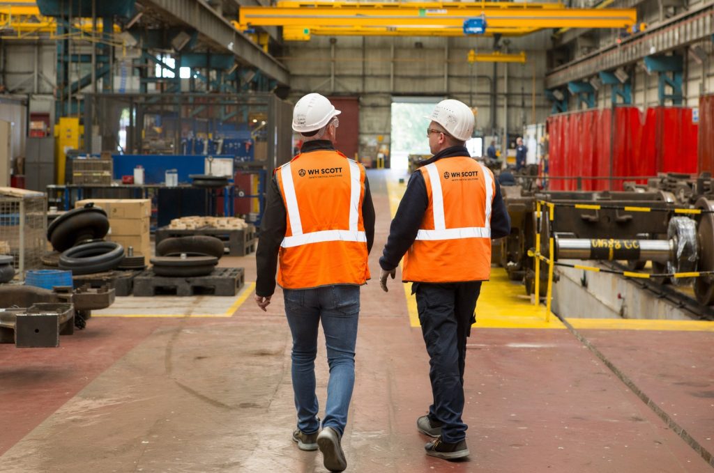 WH Scott engineers walking the site
